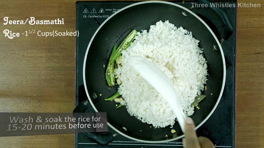 jeera rice adding rice